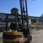 Дизельный погрузчик Caterpillar TH580B, 1.5 тонн